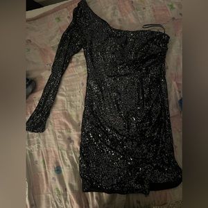 Black one sleeved homecoming dress. Very sparkly.